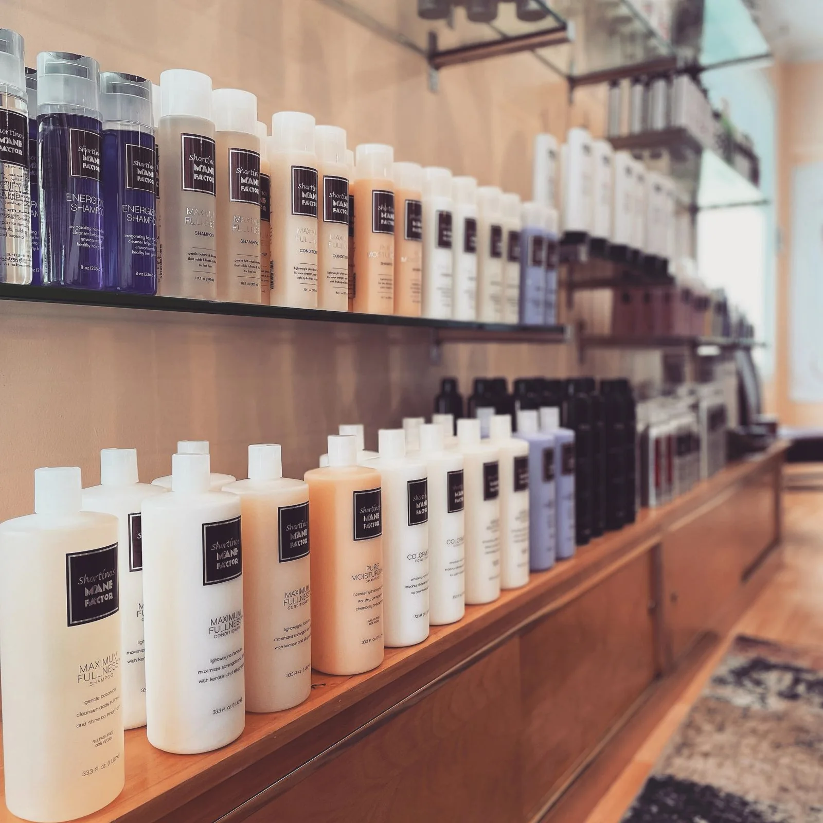 Shortino's private-label shampoo and conditioner bottles
