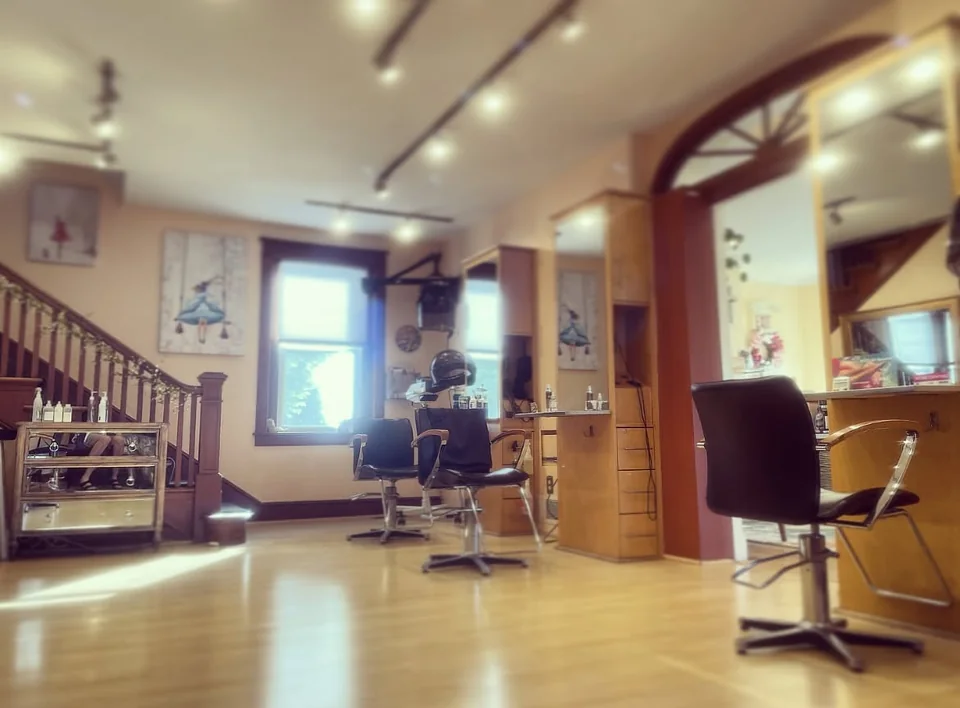 Styling stations and natural light inside Shortino's Salon & Spa on East Market Street