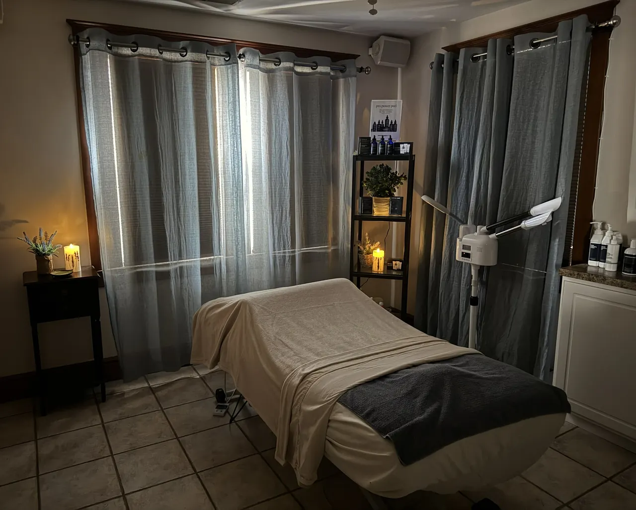 Facial treatment room with steamer and candles at Shortino's Salon & Spa in York, PA